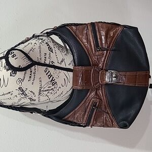 Brighton pebbled black leather shoulder hobo handbag.